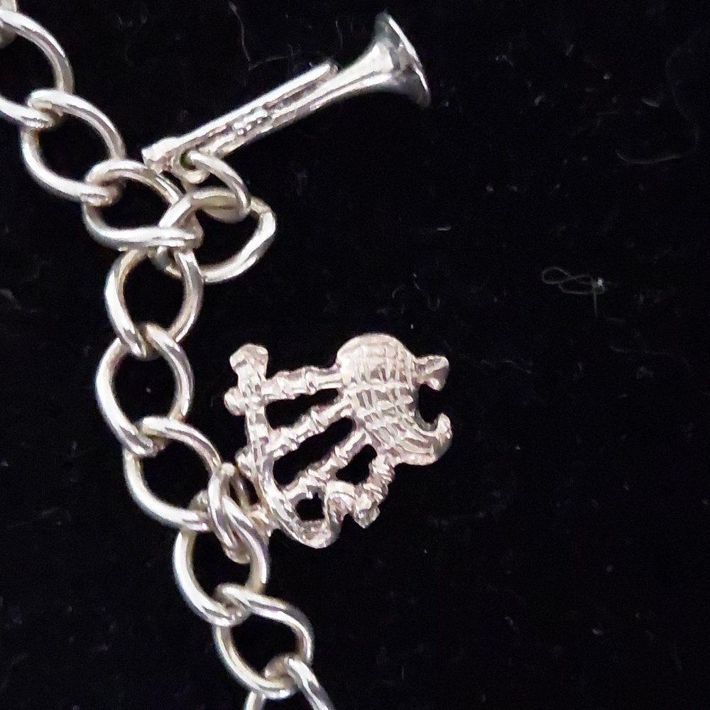 Sterling silver charm bracelet with music theme. - Picture 3 of 5